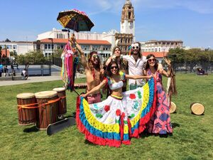 Dancers and drummers on the lawn